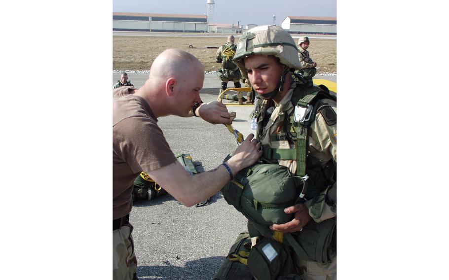 Jump masters made sure all the troops had their parachutes secured Wednesday before the 173rd Airborne Brigade took to the skies.