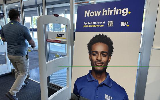 A hiring sign is displayed at a retail store in Vernon Hills, Ill., Saturday, Sept. 7, 2024. (AP Photo/Nam Y. Huh)