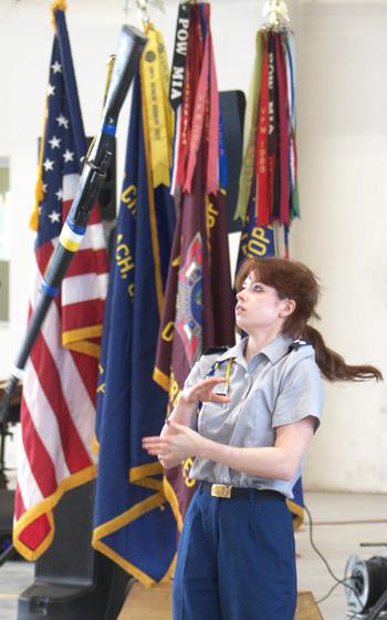 Jazz Symak concentrates while her rifle twirls.