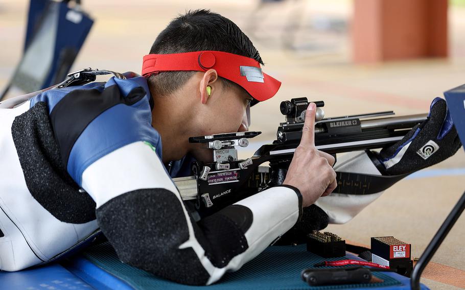 Army Staff Sgt. Kevin Nguyen adjusts his sights during the third portion of the U.S. Paralympic Shooting Trials April 21-28, 2024, in Anniston, Alabama.