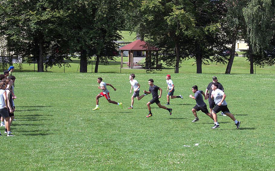 The Vilseck football team sprints through speed and agility drills during their first practice of the new season in Vilseck, Germany, on Monday, Aug. 5, 2024.