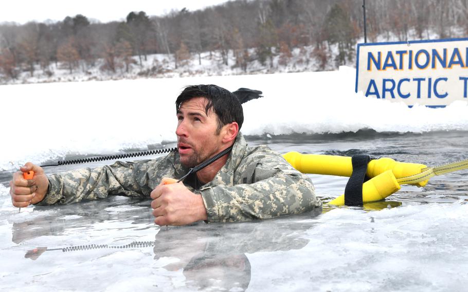 An airman participates in a cold-water immersion