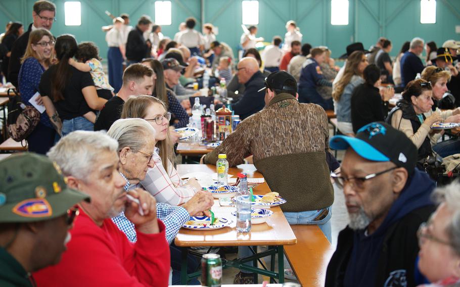 A large group of people gather at the ceremony in Ansbach.