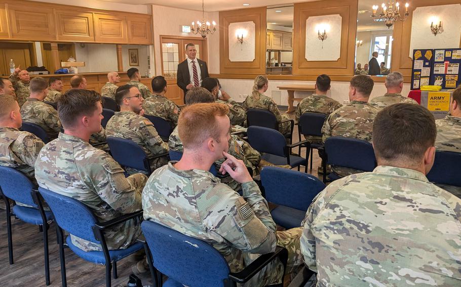 CEO of Army Emergency Relief Tony Grinston speaks with command teams in Grafenwoehr, Germany