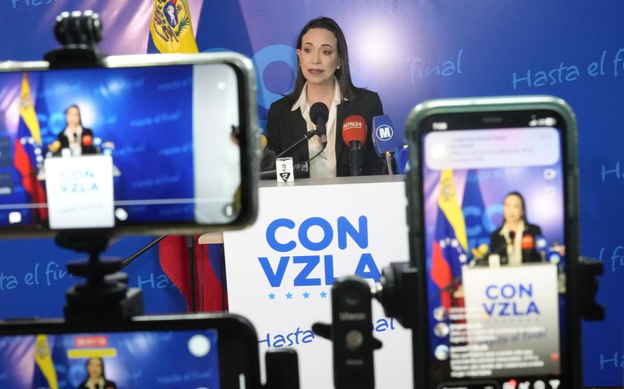 Opposition presidential hopeful Maria Corina Machado gives a press conference at her campaign headquarters in Caracas, Venezuela, Dec. 15, 2023. 