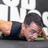 Maj. Tommy Vu of the Oregon Army National Guard executes one of 1,027 chest-to-ground burpees during his Guinness World Records attempt at Physiq Fitness in Salem, Ore., Oct. 5, 2024.