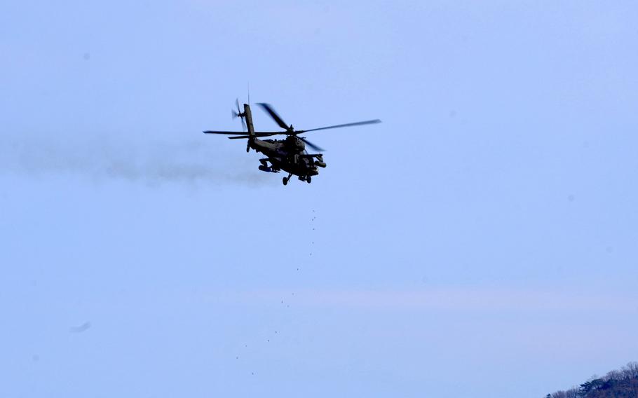 A U.S. Army AH-64 Apache fires its 30mm machine gun over the Rodriguez Live Fire Complex.