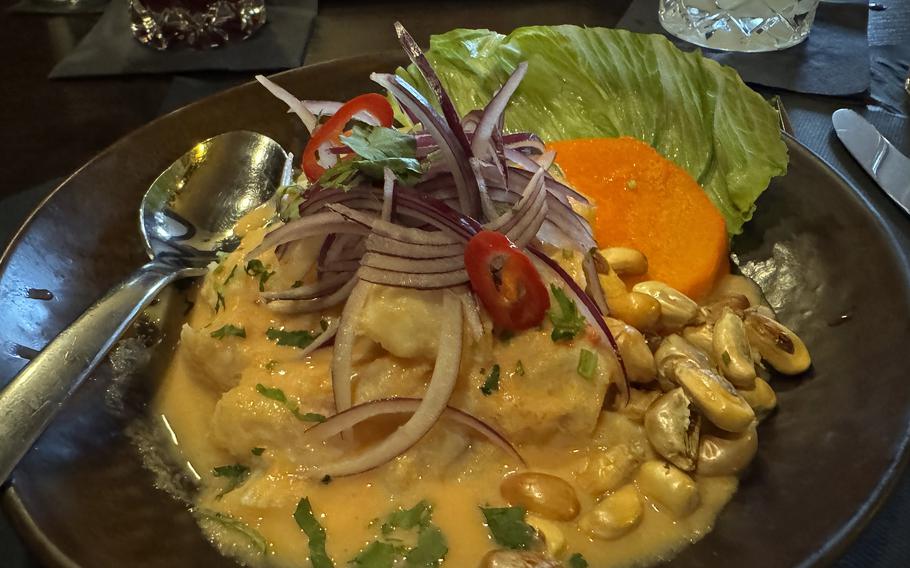 Ceviche de pescado is a traditional Peruvian dish, made with fresh fish marinated in lime juice and refined with coriander, fresh garlic and peppers. It was served at Mi Peru in Darmstadt with roasted corn and sweet potatoes. It was tangy, slightly hot and delicious.