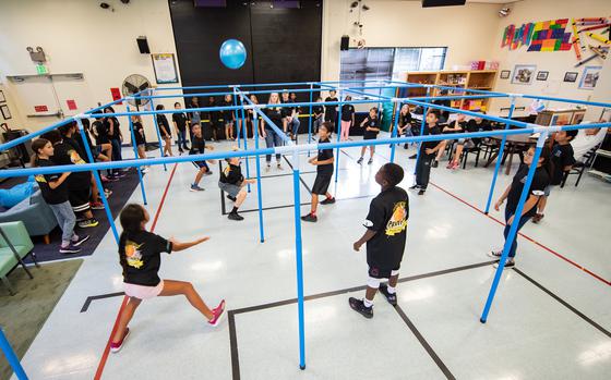 Youth center children play nine square in the air at Kadena Air Base, Okinawa, Sept. 28, 2019.