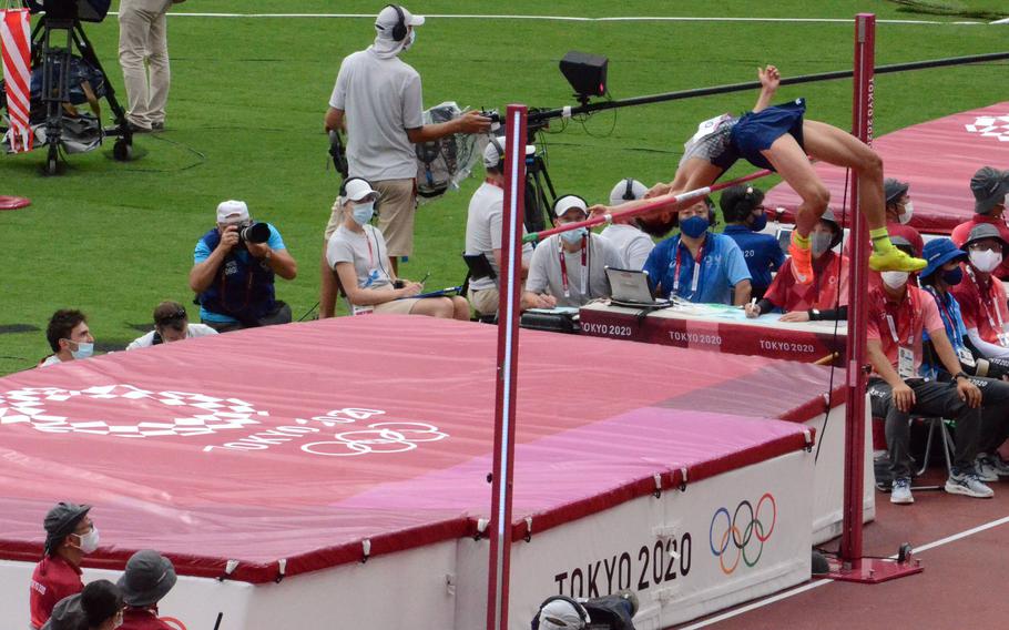 Private 1st Class Woo Sang-hyeok, 25, of the Korea Armed Forces Athletic Corps, takes part in the men's high jump event at new National Stadium in Tokyo, July 30, 2021. 