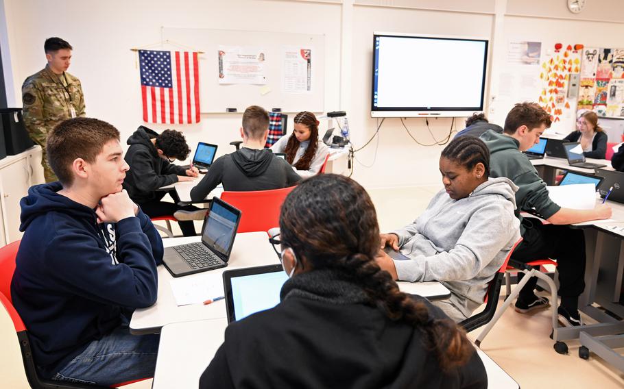 Kaiserslautern High School students get ready to take the Armed Services Vocational Aptitude Battery in Kaiserslautern, Germany, on Dec. 14, 2022. The use of calculators will be permitted on the military’s entrance exam under a plan the Pentagon is developing.