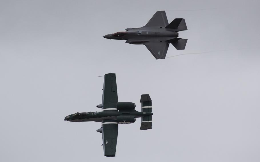 An A-10 Thunderbolt II and F-35 Lightning II fly side by side over Laughlin Air Force Base, Texas, in October 2020. 