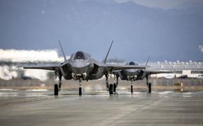 F-35B Lightning II stealth fighters with Marine Fighter Attack Squadron 214 taxi after arriving at Marine Corps Air Station Iwakuni, Japan, March 8, 2025. 