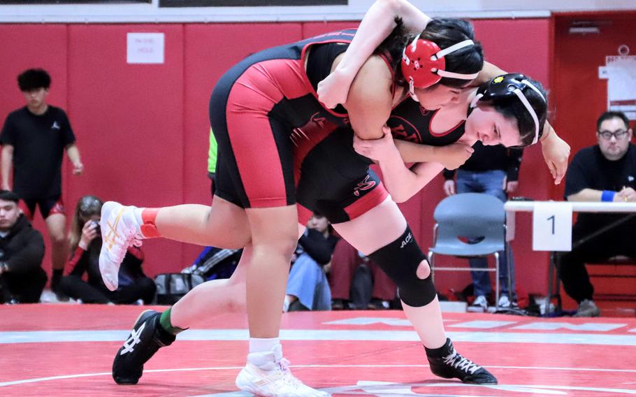 Holly Albright and Adriana Casarez wrestle.