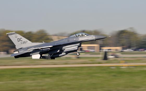 A Washington D.C., Air National Guard F-16 Fighting returns from a training mission April 3, 2012, at Joint Base Andrews, Md. The D.C. ANG provides air sovereignty forces to defend the nation's capital, and also provides fighter, airlift and support forces capable of local, national and global employment.