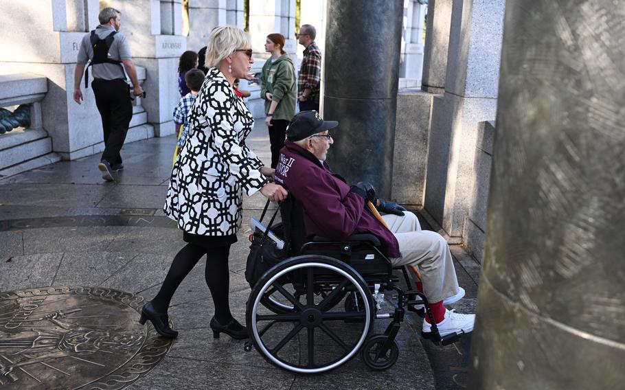 Michelle Guilbault pushes the wheelchair of her father, WWII veteran Witold Victor Brick.