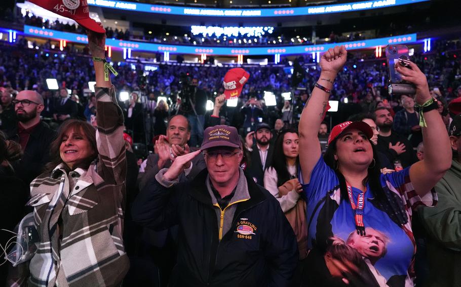 A crowd cheers at a campaign rally at Madison Square Garden.