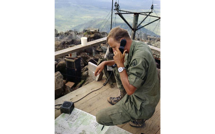 From his vantage point at the radio relay station atop 3,200-foot Nui Ba Den mountain in October, 1969, 1st Lt. John Lowe of Columbus, Ohio, an artillery officer with 3rd Battalion, 22nd Infantry, 25th Infantry Division, spends his day calling in artillery strikes on the surrounding flatlands and hills.