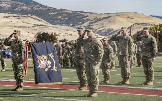 Oregon Army National Guard Soldiers assigned to the 1st Battalion, 186th Infantry Regiment, render a hand salute during the playing of the National Anthem as they take part in their formal mobilization ceremony on Oct. 20, 2024.