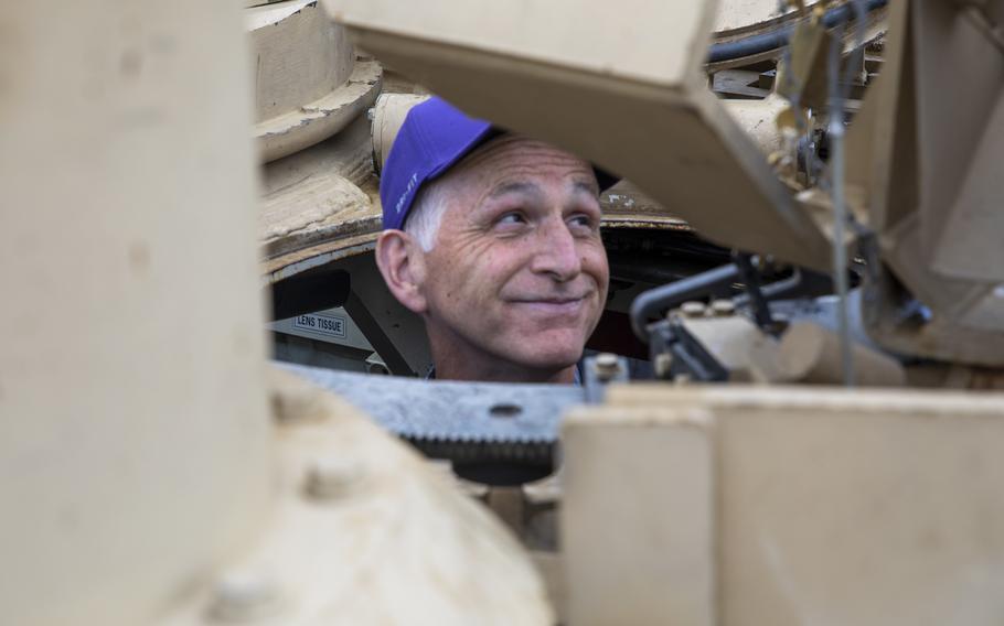 Rep. Adam Smith of Washington state, the top Democrat on the House Armed Services Committee, inside a M1 Abrams tank in Lithuania in August 2021. 