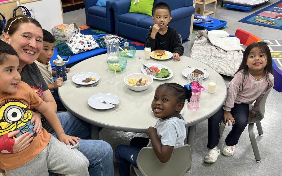 A teacher and some of her prekindergarten students enjoy lunch at Daegu Elementary in South Korea in October 2024. Pre-K was added in 80 of 90 Department of Defense Education Activity elementary schools, with more to be added in the coming school year. 