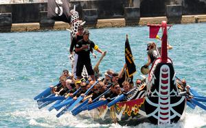 HED: Naha Hari dragon boat race, 2010

Naha, Okinawa, May 5, 2010: The Torii Knights race to the halfway point buoy where they would turn around and race back to the finish line during the annual Naha Hari dragon boat races at Naha, Okinawa. The Knights would go on to win the heat in a time of 5 minutes and 53 seconds. Multiple military teams competed against Japanese teams from all over Okinawa.

Read the article and check out who won here.
https://www.stripes.com/news/2010-05-07/dragon-boats-race-for-bragging-rights-1901718.html1

META TAGS: U.S. Army; U.S. Air Force; U.S. Marine Corps; Tomari Port; sports; Japanese culture; U.S. Navy; Torrii Knights
