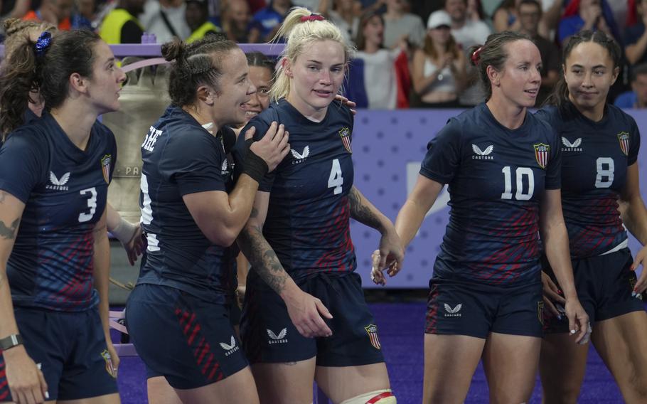 Army Capt. Sammy Sullivan (4), who sealed the deal with the final score, and the United States team celebrate after winning their rugby sevens quarterfinal match against Great Britain at the Olympics in Saint-Denis, France, on July 29, 2024.