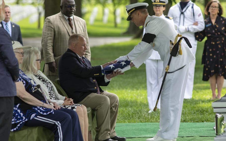 Adam Morrill, the grandnephew of Starring Brooks Winfield, receives the American flag during his funeral service at Arlington National Cemetery on May 9, 2024.