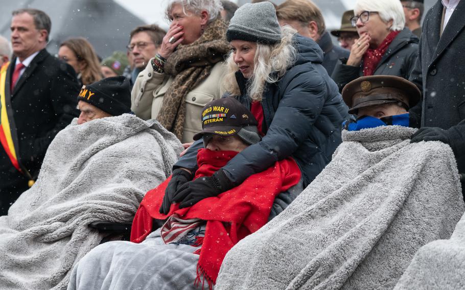 Veterans brave near freezing temperatures during commemorations in Bastogne, Belgium.