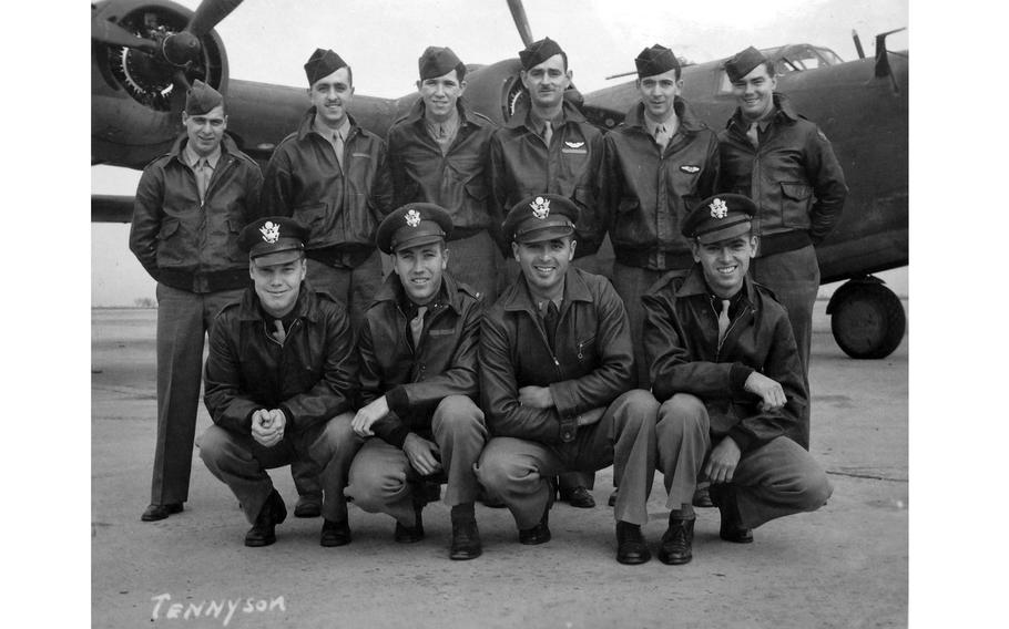 The crew of a WWII bomber in uniform.