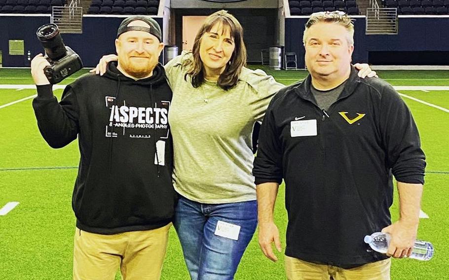 From left, Brat Legacy Films crew members Matt Bills, Kimberly McKay and Brad Heath take a break from shooting to pose at the Dallas Cowboys practice facility in Frisco, Texas, in February 2023.