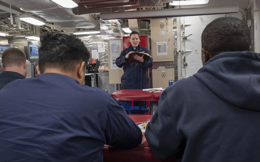 Lt. Sarah Gomez-Lorraine, chaplain for the USS Spruance, holds Sunday service on July 21, 2024. 