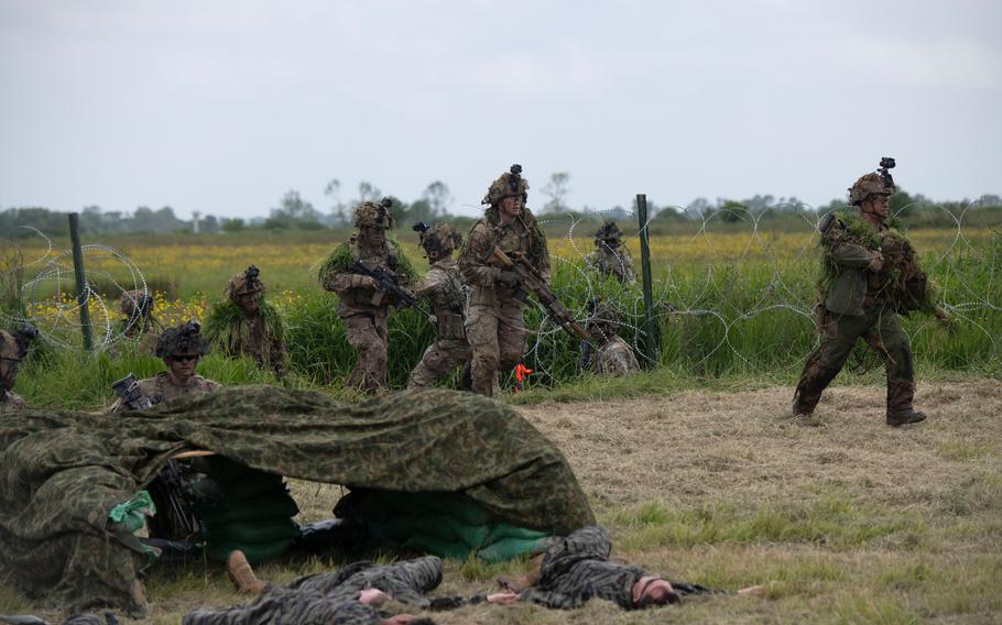 Soldiers assigned to the 101st Airborne Division participate in an air assault demonstration in Carentan, France, on June 2, 2024.