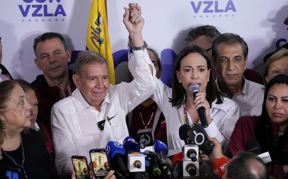 Venezuelan opposition presidential candidate Edmundo Gonzalez, left, and party leader Maria Corina Machado hold a press conference in Caracas on July 29, 2024.