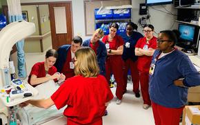 Lt. Christina Acosta, a labor and delivery nurse on the Naval Hospital Rota Multiservice Ward, demonstrates newborn resuscitation procedures at the U.S. Naval Hospital Rota in Spain, March 1, 2024. The hospital has stopped delivering babies because the local ambulance service provider’s response time is insufficient.