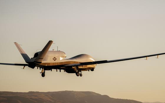 An MQ-4C Triton prepares to land at Naval Air Station Sigonella in Italy on July 2, 2024. The Triton's maker, Northrop Grumman, saw a 5.8% increase in revenues, reaching $35.6 billion as arms sales surged globally in 2023, according to a new report.