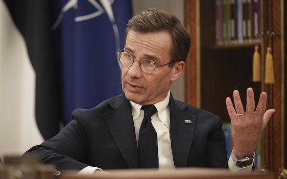 Sweden Prime Minister Ulf Kristersson speaks to the Associated Press during an interview at the Estonian Knighthood House in Tallinn, Estonia, on Dec. 17, 2024. (AP Photo/Sergei Grits)