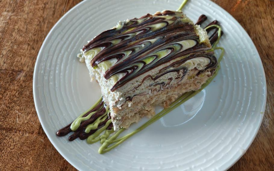 Pistachio tiramisu is a dessert menu star at Limoncello in Cambridge, England. The moist and airy cake is bathed in pistachio-and-chocolate cream.