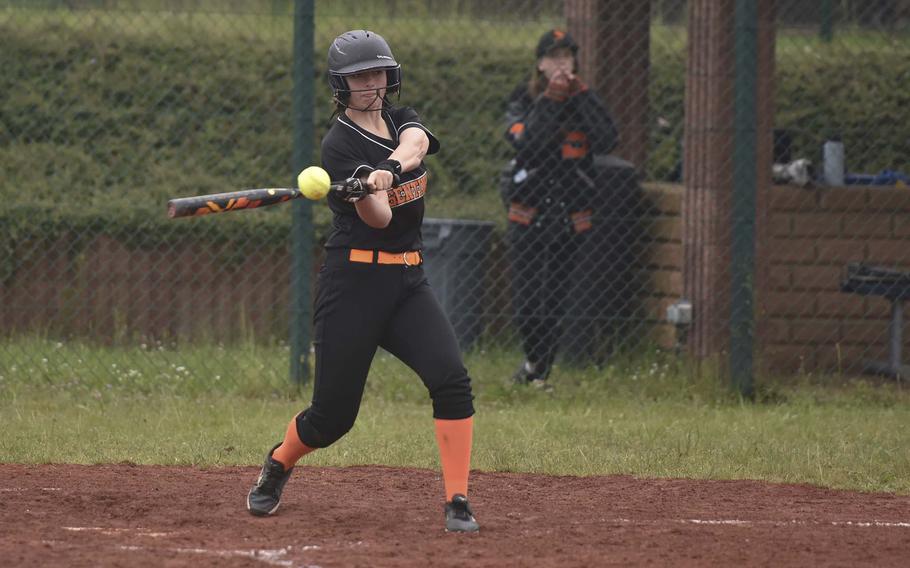 Spangdahlem freshman Allie Adkins hits the ball during a game against Hohenfels during the European championships on May 22, 2024, at Ramstein Air Base, Germany. Adkins recorded a double on the hit.