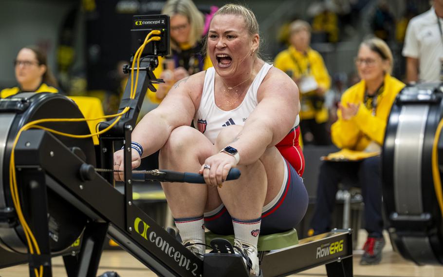 A competitor competes in indoor rowing