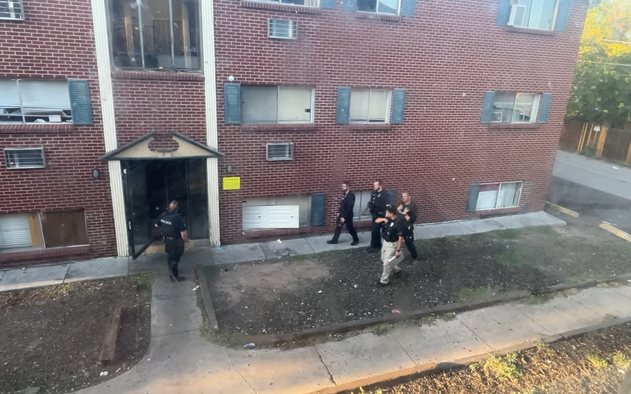 Aurora police inspect apartment