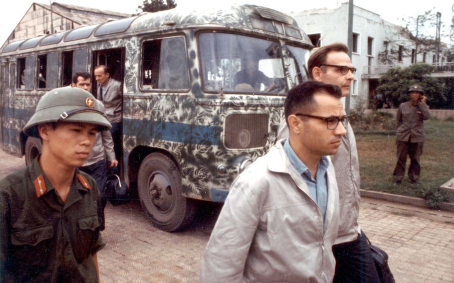 American POWs arrive by bus at Hanoi’s Gia Lam Airport for release in this undated photo from February 1973. 