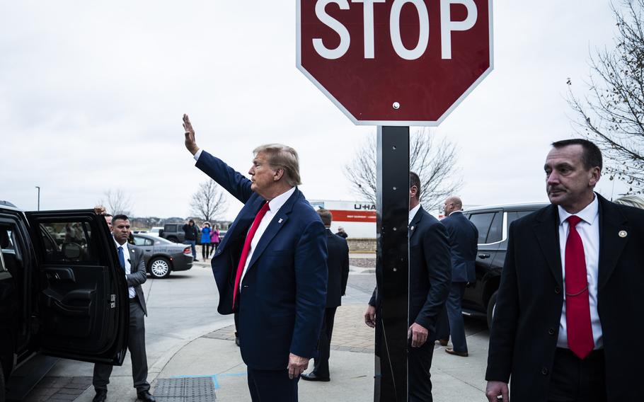 Former president Donald Trump departs after speaking at a Commit to Caucus rally held at Whiskey River on Saturday, Dec. 2, 2023, in Ankeny, Iowa.