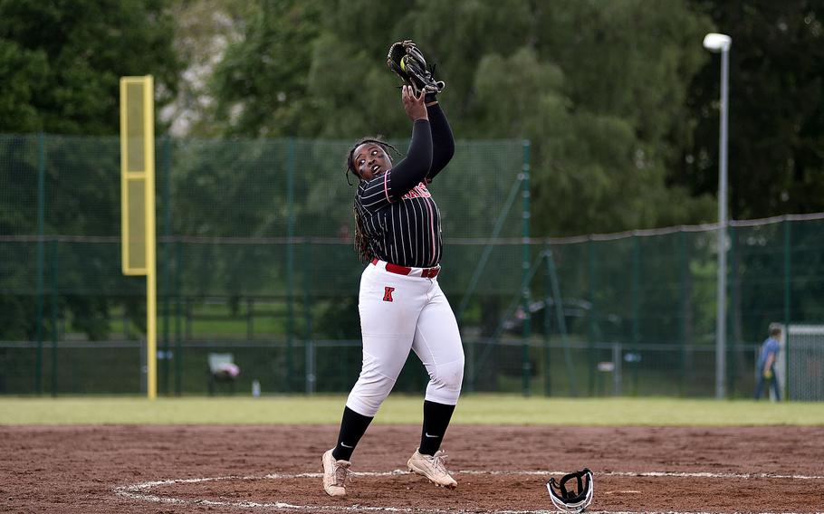Kaiserslautern pitcher Bevanie Cleark looks to third base after catching a flyball during the Division I DODEA European softball championship game against Ramstein on May 24, 2024, at Kaiserslautern High School in Kaiserslautern, Germany.