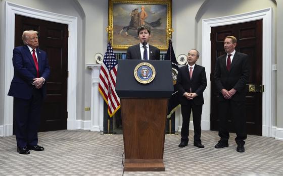 Sam Altman, OpenAI CEO, speaks as President Donald Trump, left, Masayoshi Son, SoftBank Group CEO, third from left, and, Larry Ellison, chairman of Oracle Corporation and chief technology officer, right, listen, in the Roosevelt Room at the White House, Tuesday, Jan. 21, 2025, in Washington. (AP Photo/Julia Demaree Nikhinson)