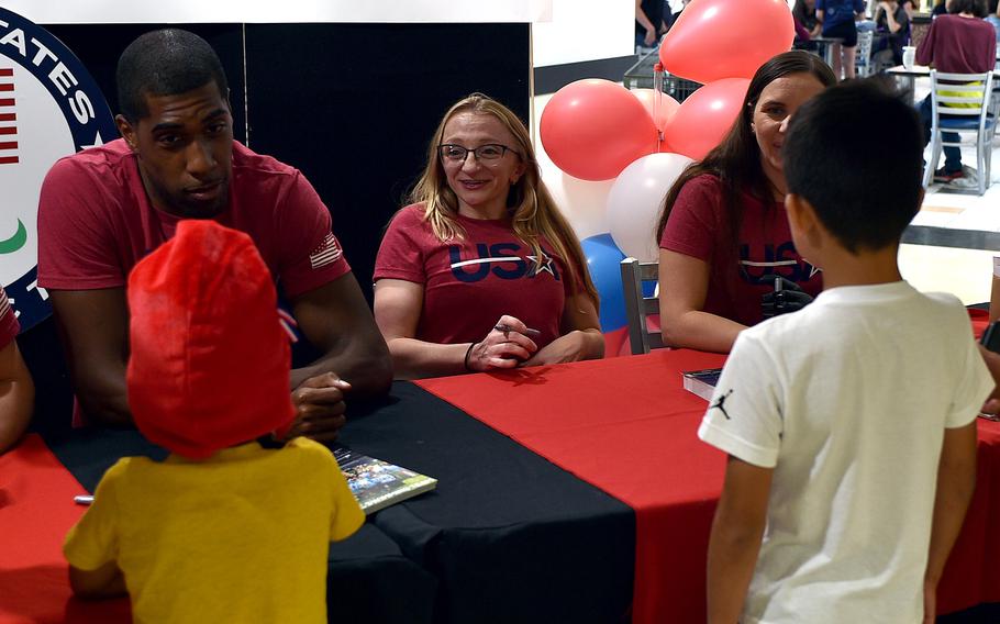 Paralympians with child fans