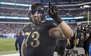 A U.S. Militay Acadamy football player, Jaxson Deaton, interacts with the crowd during the 119th Army-Navy Game at Lincoln Financial Field in Philadelphia, Pa., Dec. 8, 2018.  The Army defeated the Navy for their third year in a row. (U.S. Army photo by Spc. James Harvey)