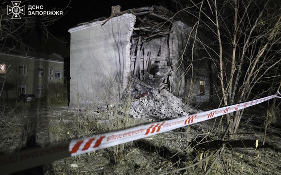 In this image provided by the Ukrainian Emergency Service on Monday, Nov. 11, 2024, a building is seen destroyed by a Russian attack in Zaporizhzhia, Ukraine. (Ukrainian Emergency Service via AP)