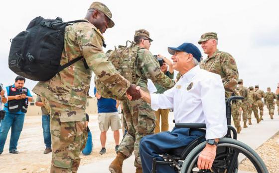 Texas Gov. Greg Abbott greets Texas National Guard troops at Forward Operating Base Eagle Pass on May 31, 2024.