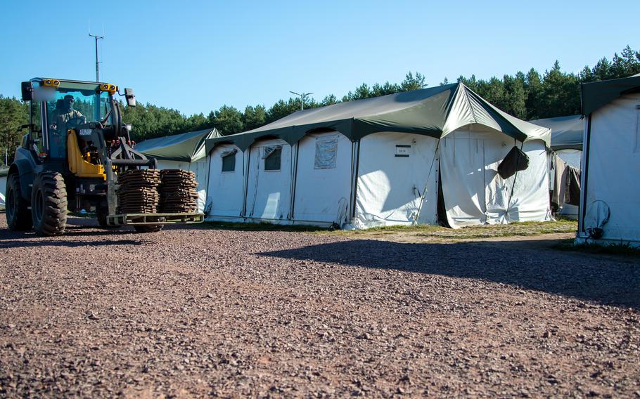 White tents stand in neat rows at the Klietz military training range in Germany, where Ukrainian soldiers are being trained to operate Leopard 1 A5 tanks.